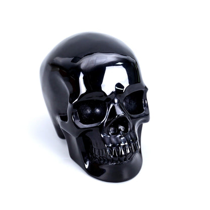 2.2 Inch Black Obsidian Crystal Skull side lying view